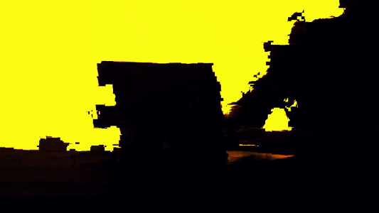 Silhouette of jagged cybersecurity rock formations against a vibrant yellow sky at dusk.