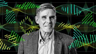 A man in a checked jacket and collared shirt stands in front of a digital background featuring stylized DNA strands and data graphs.