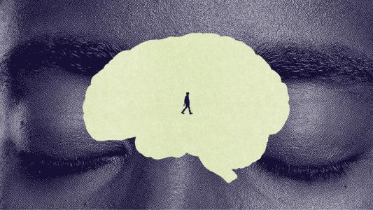 A person walks inside a large, light-colored brain shape superimposed over a close-up of a face with closed eyes.