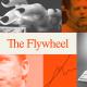 A collage featuring a hand using a smartphone, two men speaking into microphones, a vintage desktop computer, and a graph, with the text "The Flywheel" in the center.